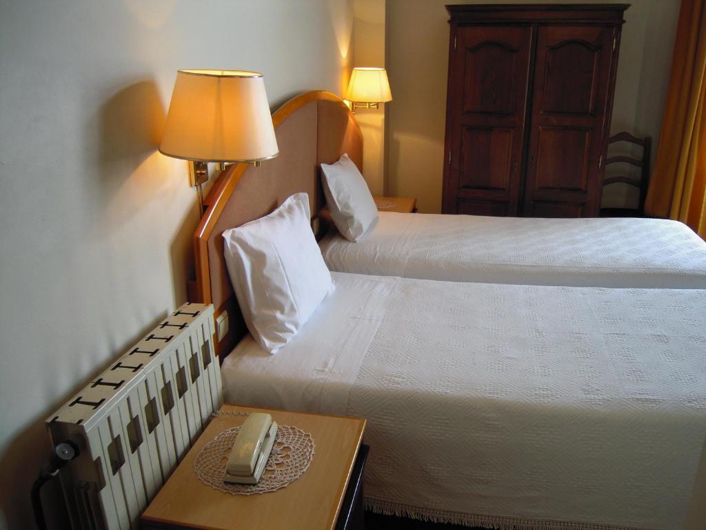 Guesthouse Lusa Atenas Coimbra Quarto foto